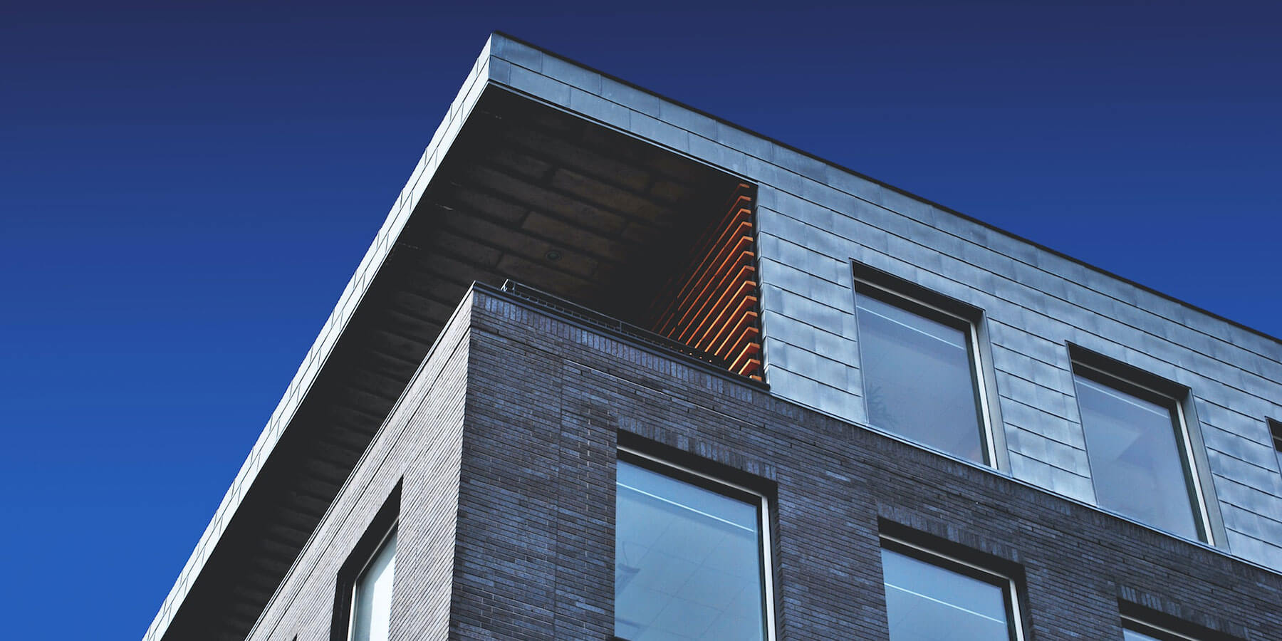 Rental-Property-Blitz Image of a brick house building on an angle